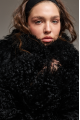 Women's black sheepskin coat made of natural llama